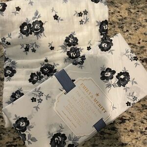 Pottery Barn Crib Sheet, black floral organic. With matching muslin blanket
